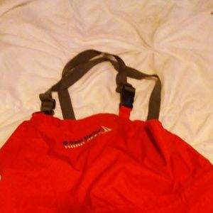 Red ski bib, ski coat and ski goggles (West Marine